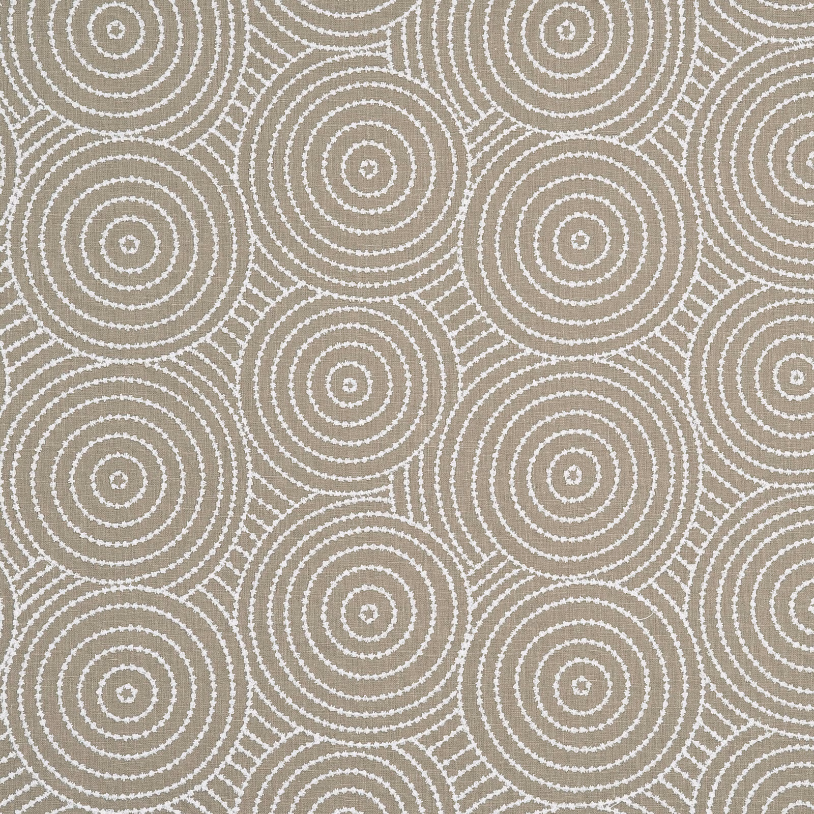 Warm taupe fabric with ivory concentric circles and woven geometric texture