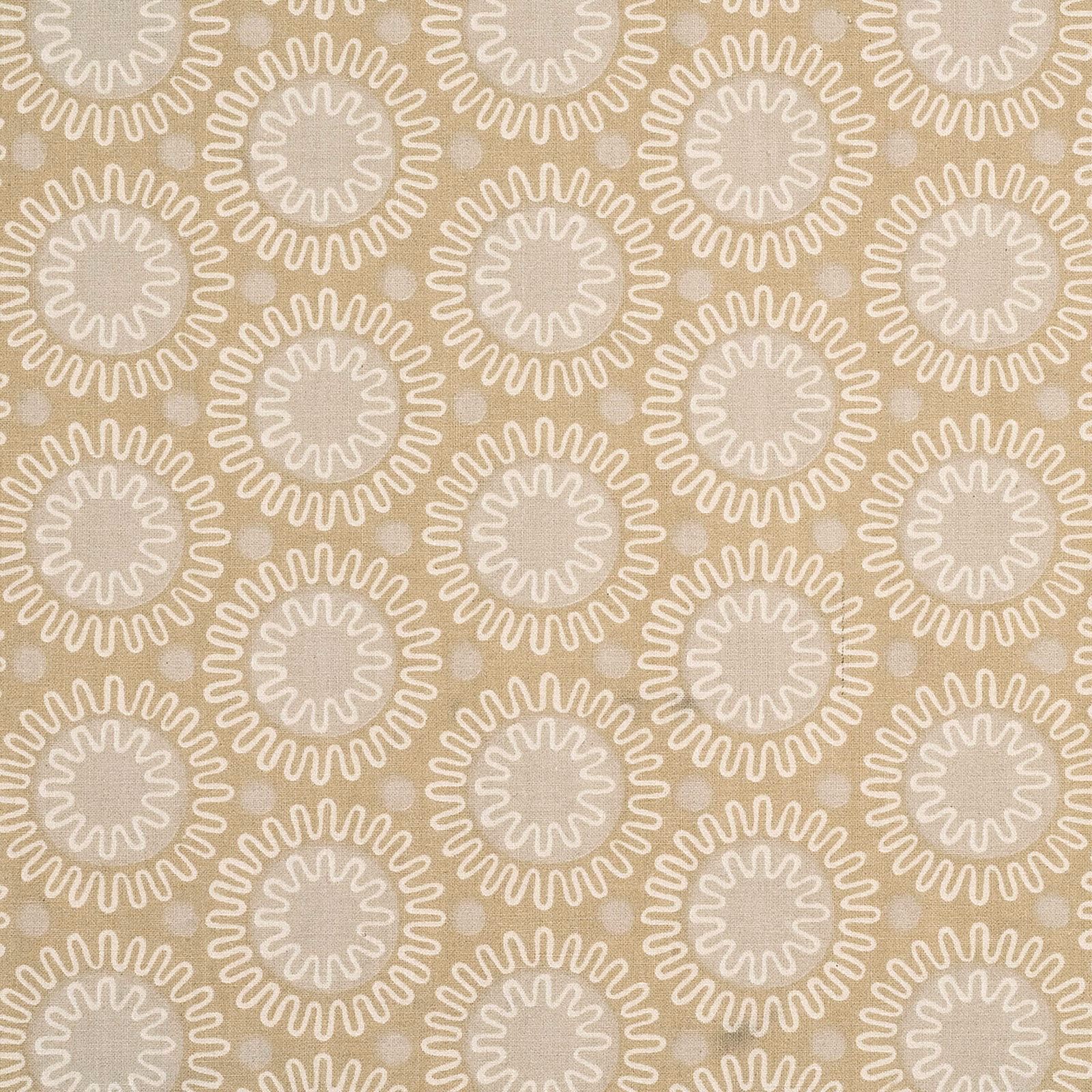 Warm biscuit cotton with ivory looping sunburst medallions in a compact repeat