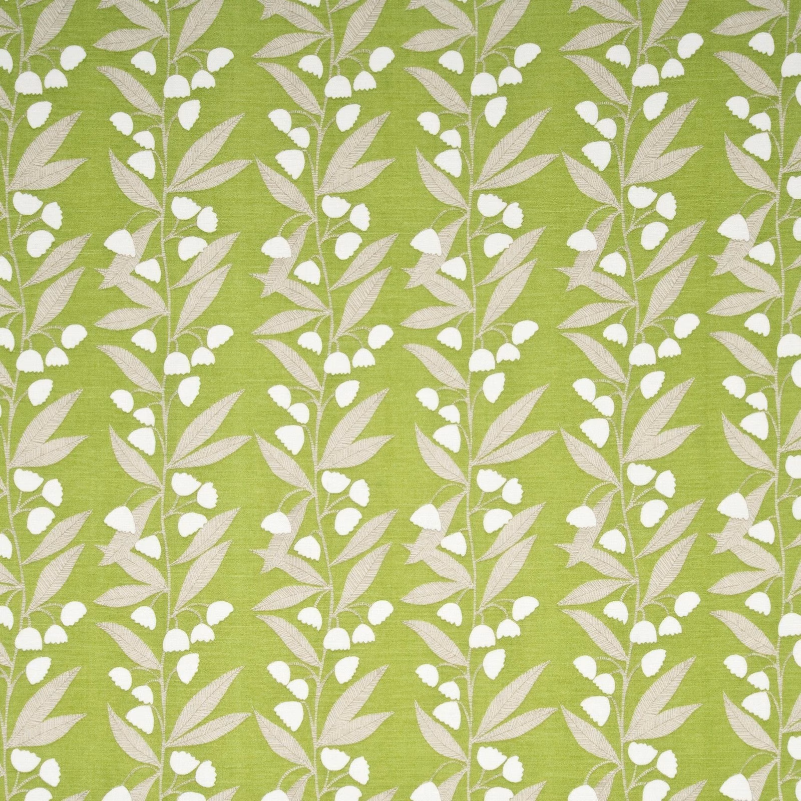 Lime-green woven fabric with white bell flowers and pale blush leaves