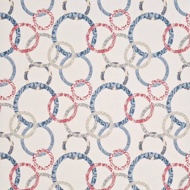 Cream wallpaper with distressed cherry and denim-blue overlapping ring motifs