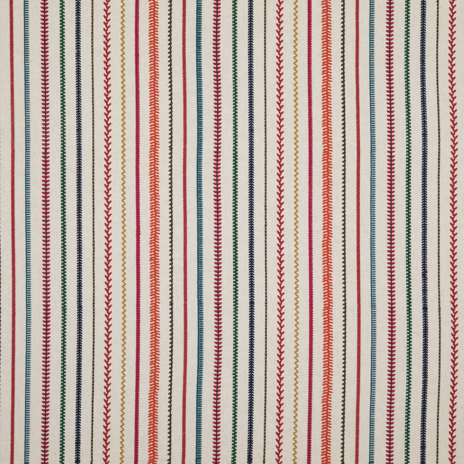 Warm cream fabric with narrow red, green, navy and mustard patterned stripes