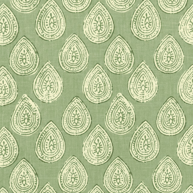 Sage green woven fabric with cream teardrop paisley motifs and fine texture