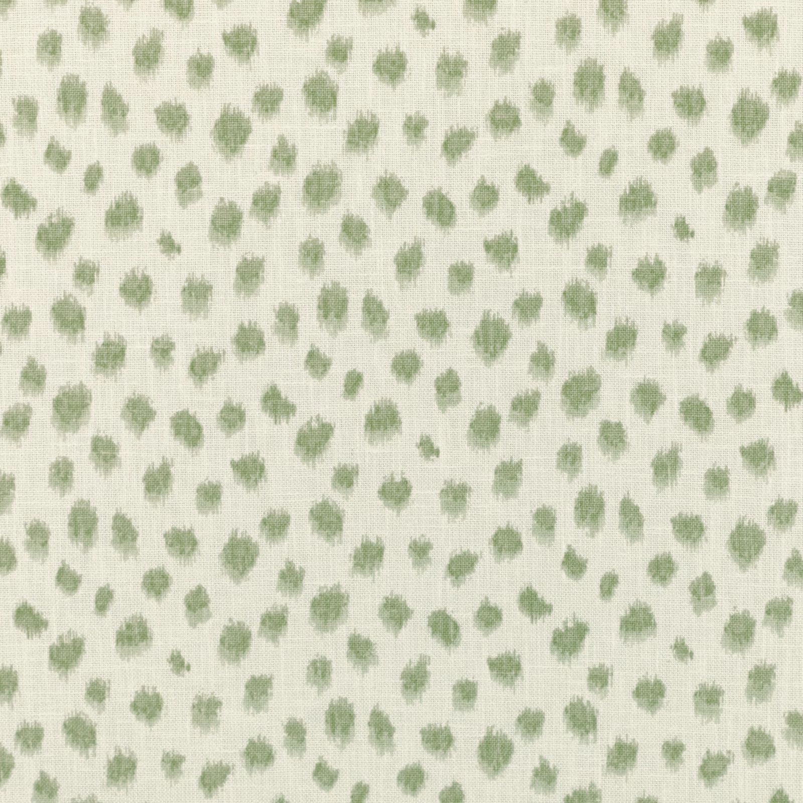 Soft sage-green flecks scattered across a cream woven Lyme Green fabric