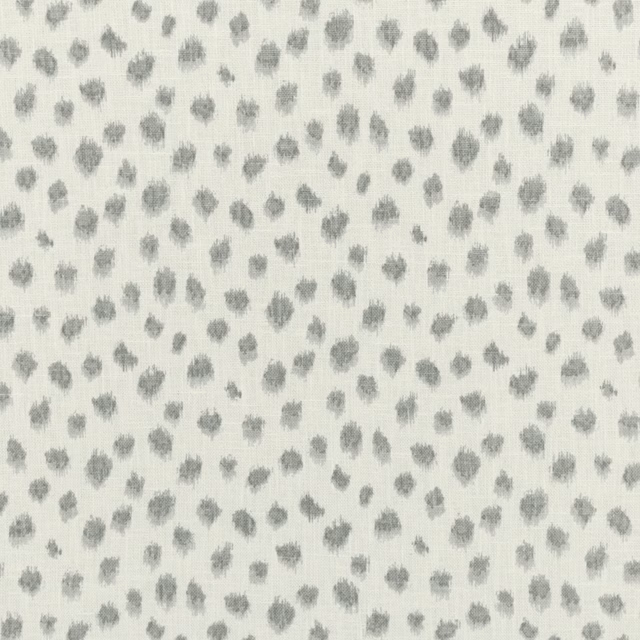 Ivory textile with scattered soft-grey brush-mark motifs in a small repeat