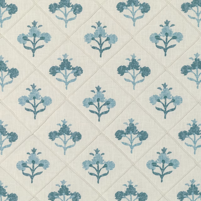 Aqua teal floral sprigs on ivory fabric with a fine diamond lattice weave