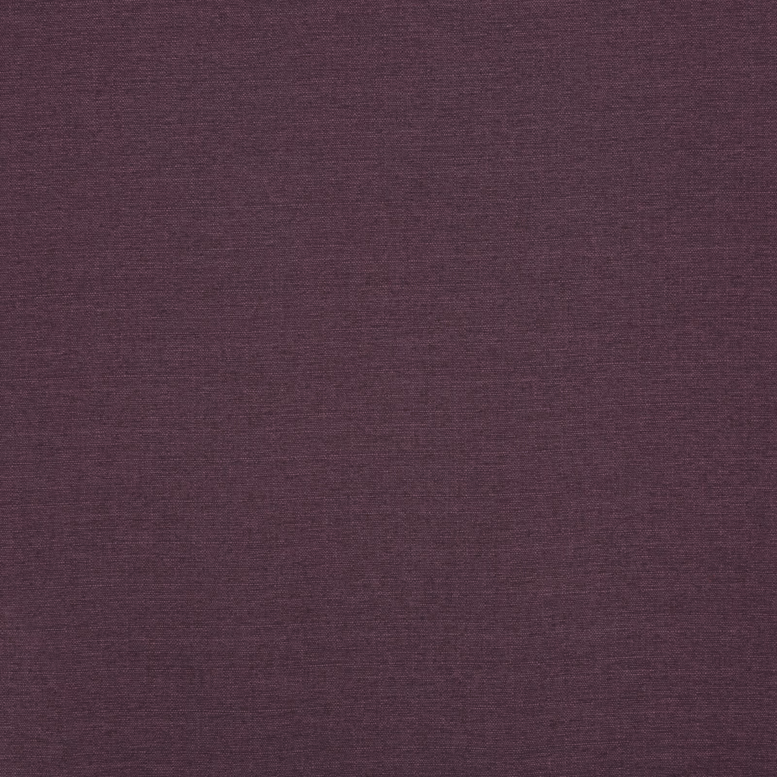 Close view of deep plum fabric with a fine, subtly varied woven texture