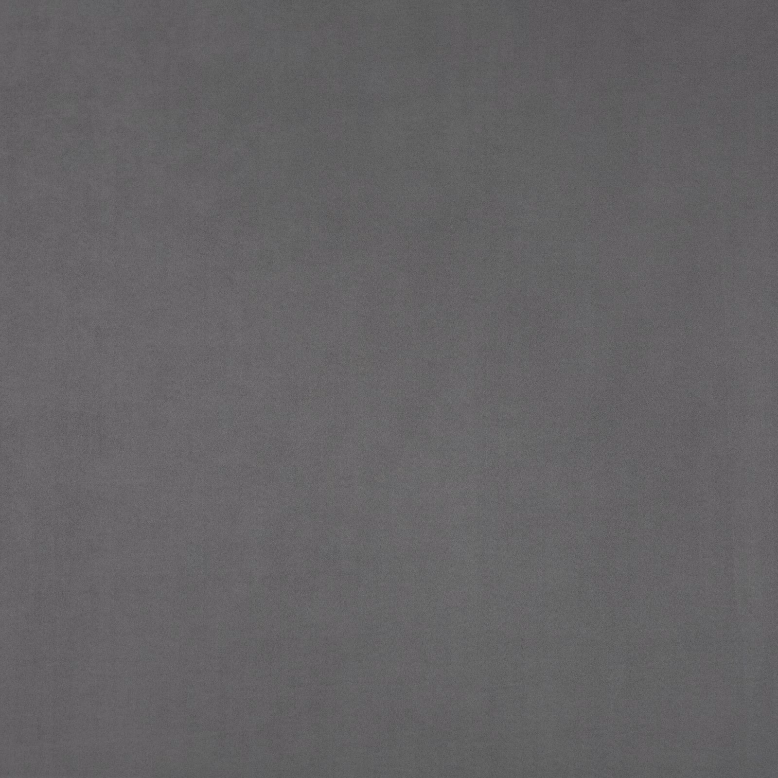 Close-up of deep graphite grey fabric with subtle fine woven tonal texture