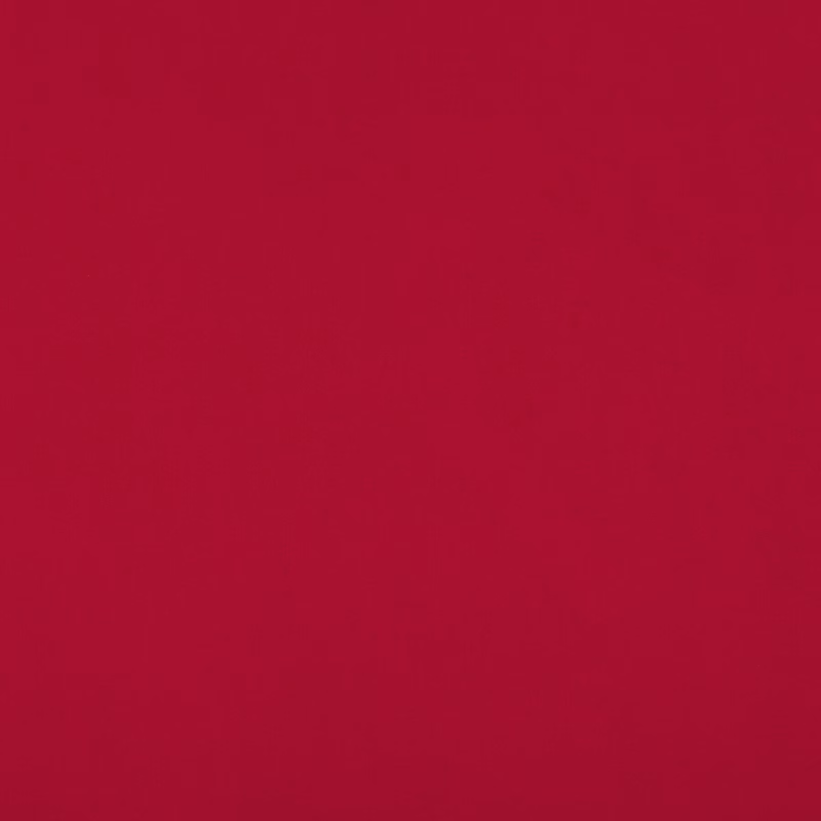 Close-up of smooth, deep raspberry-red fabric with subtle tonal grain
