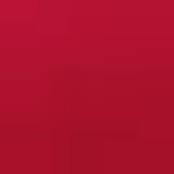 Deep raspberry-red fabric showing a smooth, subtly textured solid surface