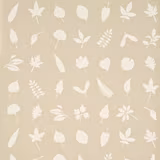 Warm linen-beige wallpaper with scattered ivory leaf silhouettes and subtle paper grain