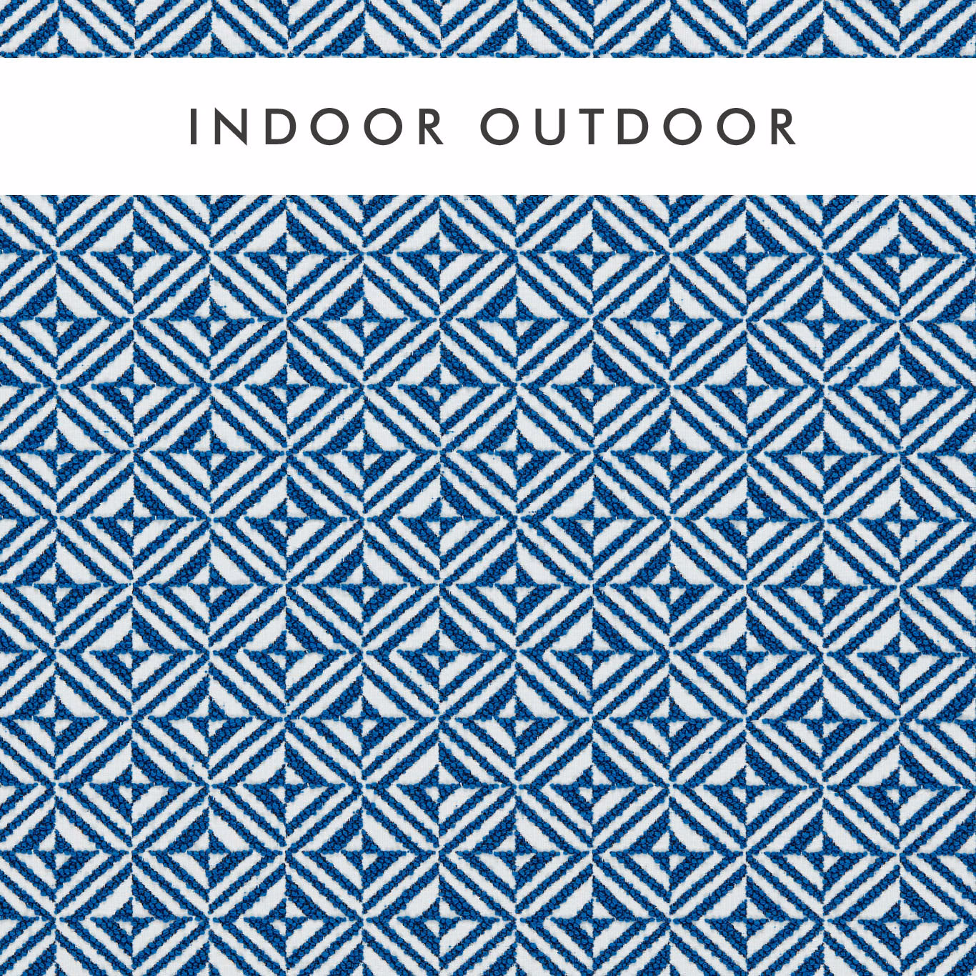 Cobalt blue and white geometric woven textile with crisp repeating diamond motifs