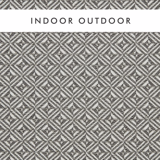 Charcoal and ivory geometric diamond weave with a finely flecked tactile surface