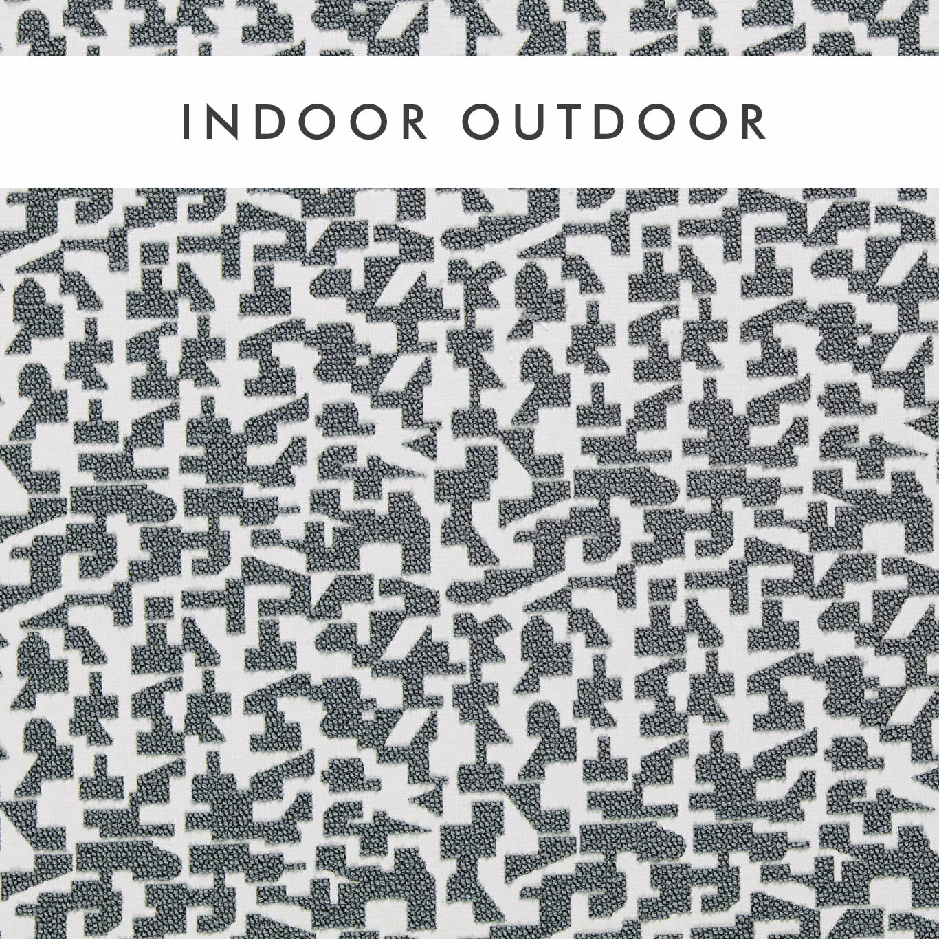 Cool charcoal geometric fragments woven across an ivory textured outdoor fabric swatch