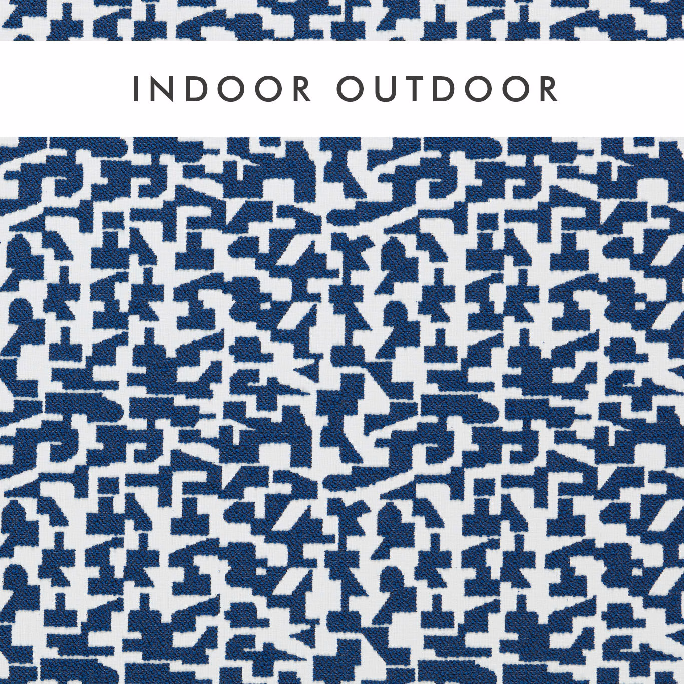 Midnight-blue fragmented geometric weave on an ivory ground, shown in close-up