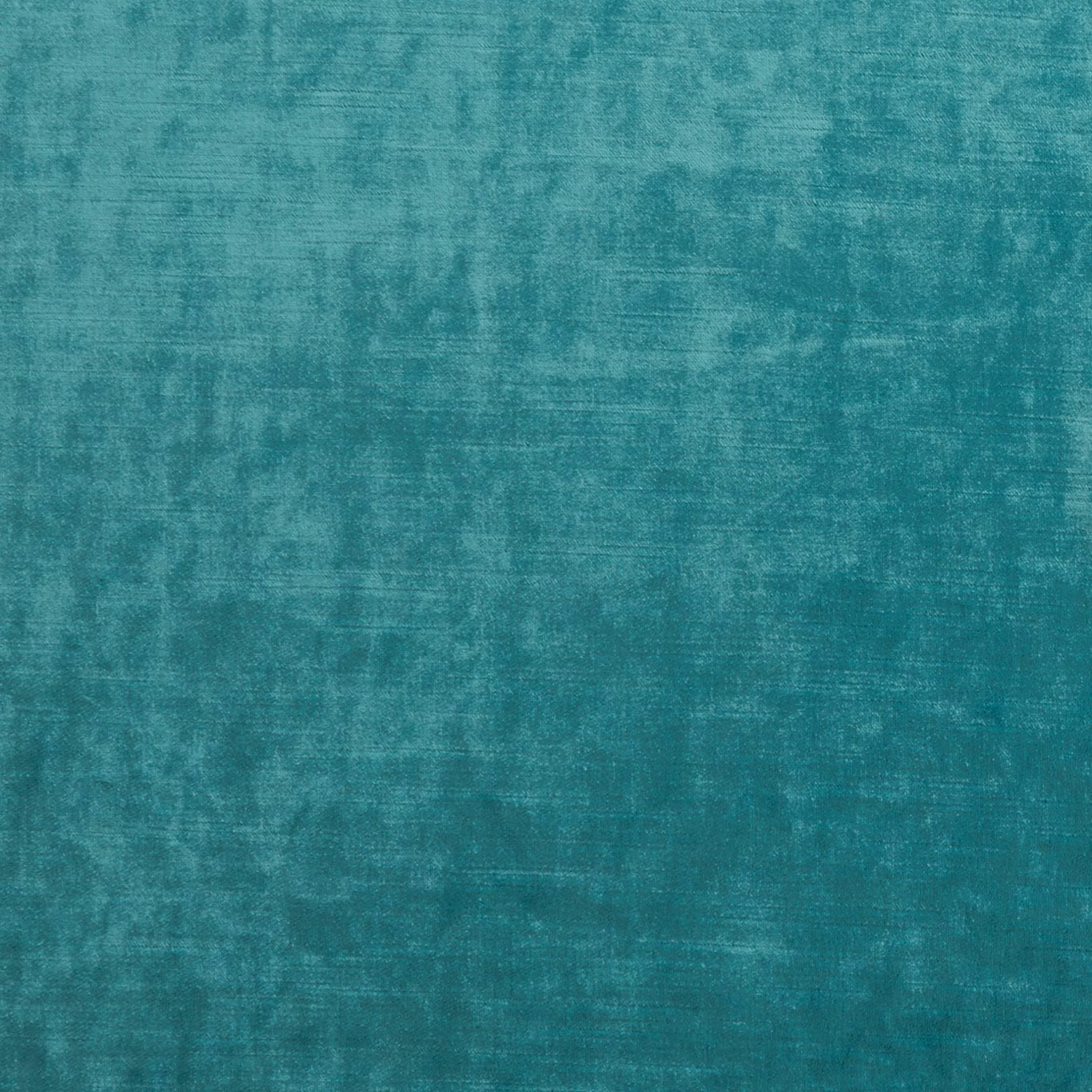 Close-up of mottled aqua teal upholstery fabric with softly brushed woven texture