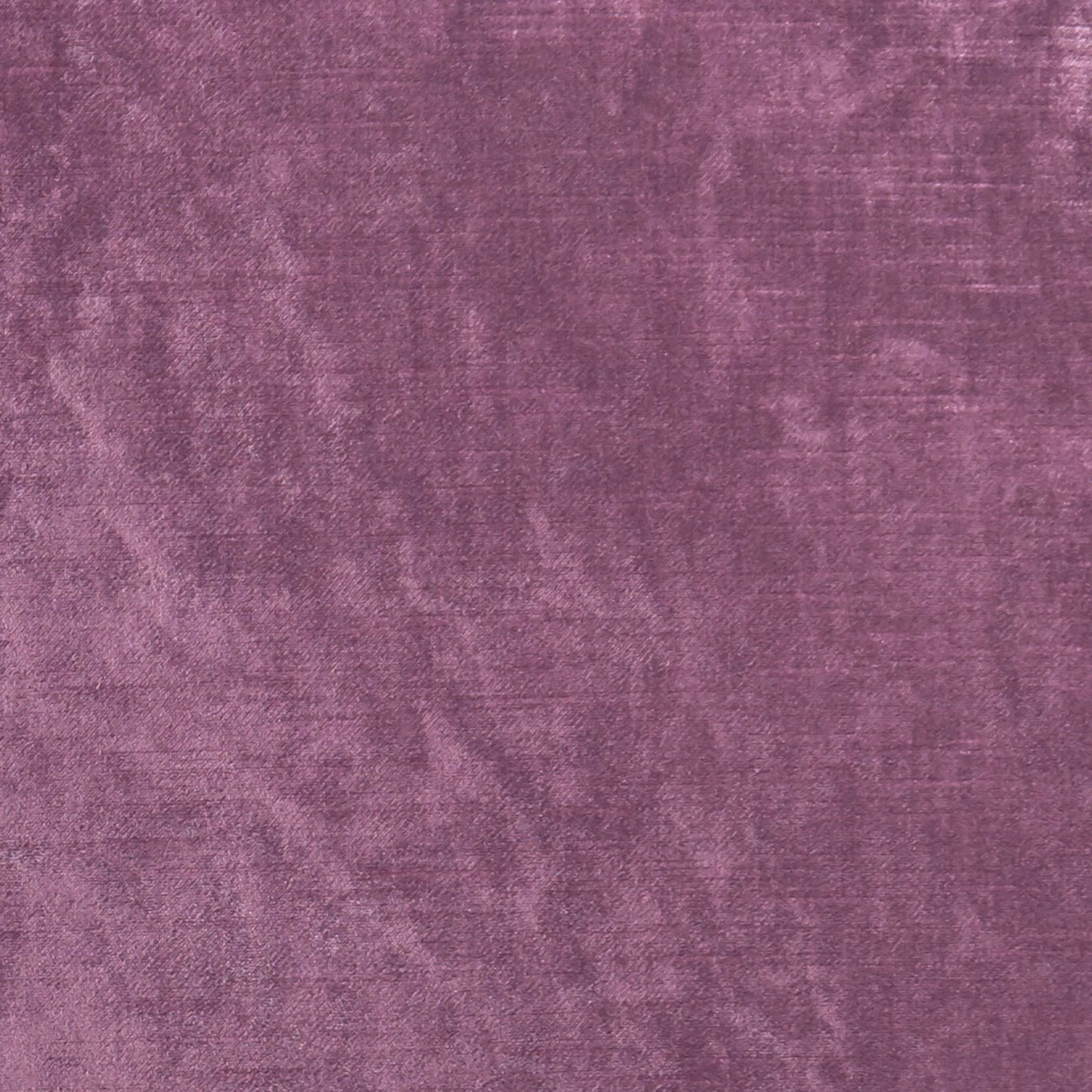 Mottled berry-purple upholstery textile with softly brushed tonal texture