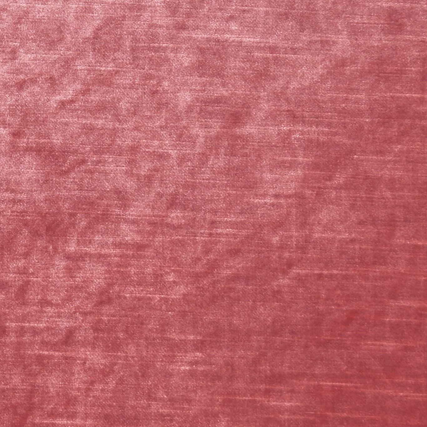 Dusky berry-pink fabric with softly brushed, horizontally mottled texture