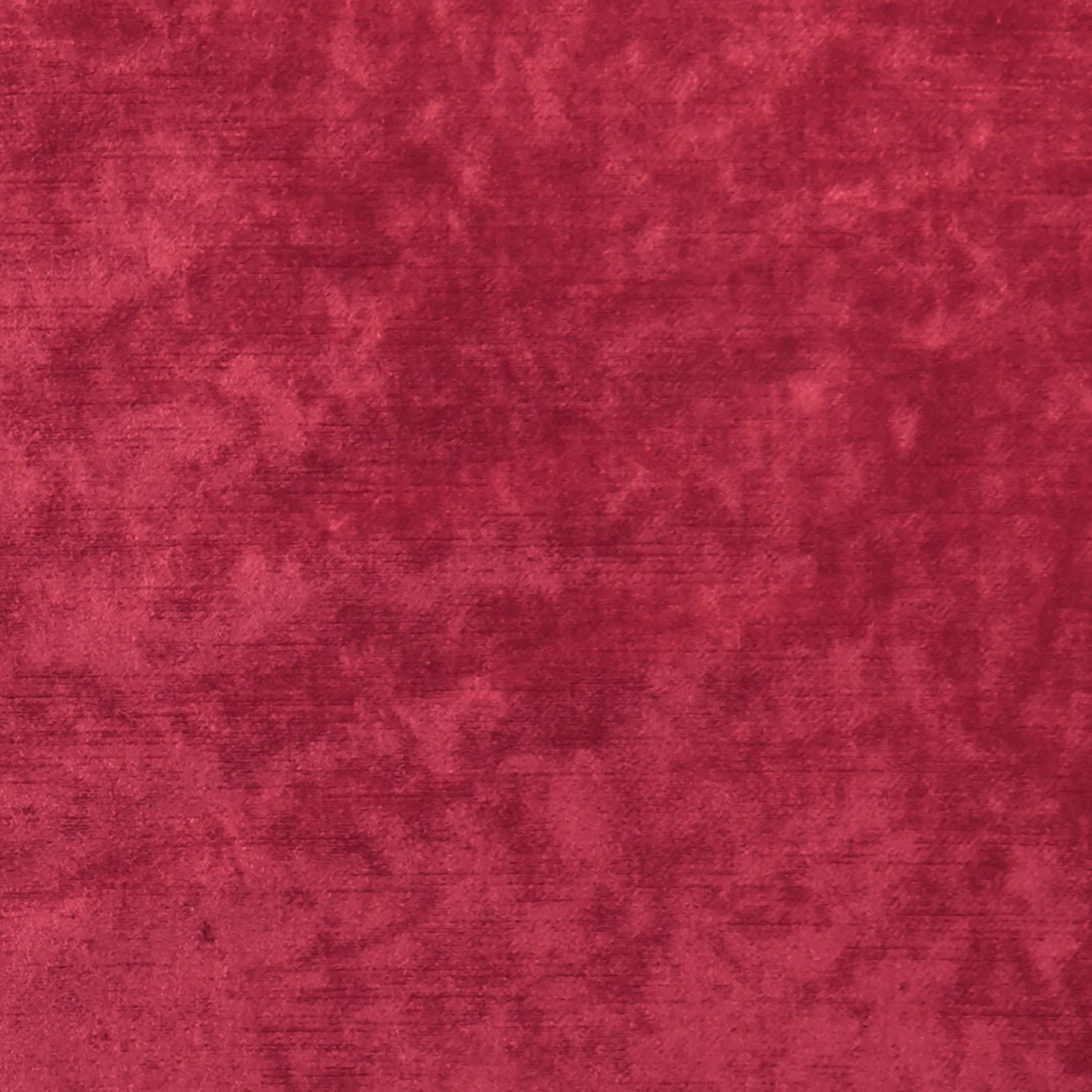 Close-up of deep claret red fabric with mottled nap and subtle sheen