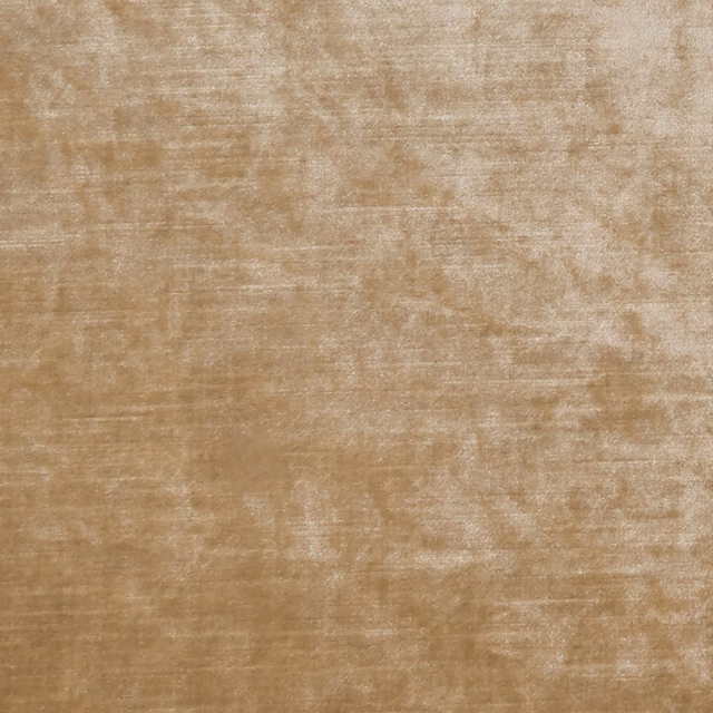 Warm dune beige fabric with softly mottled velvety pile and pale tonal streaks