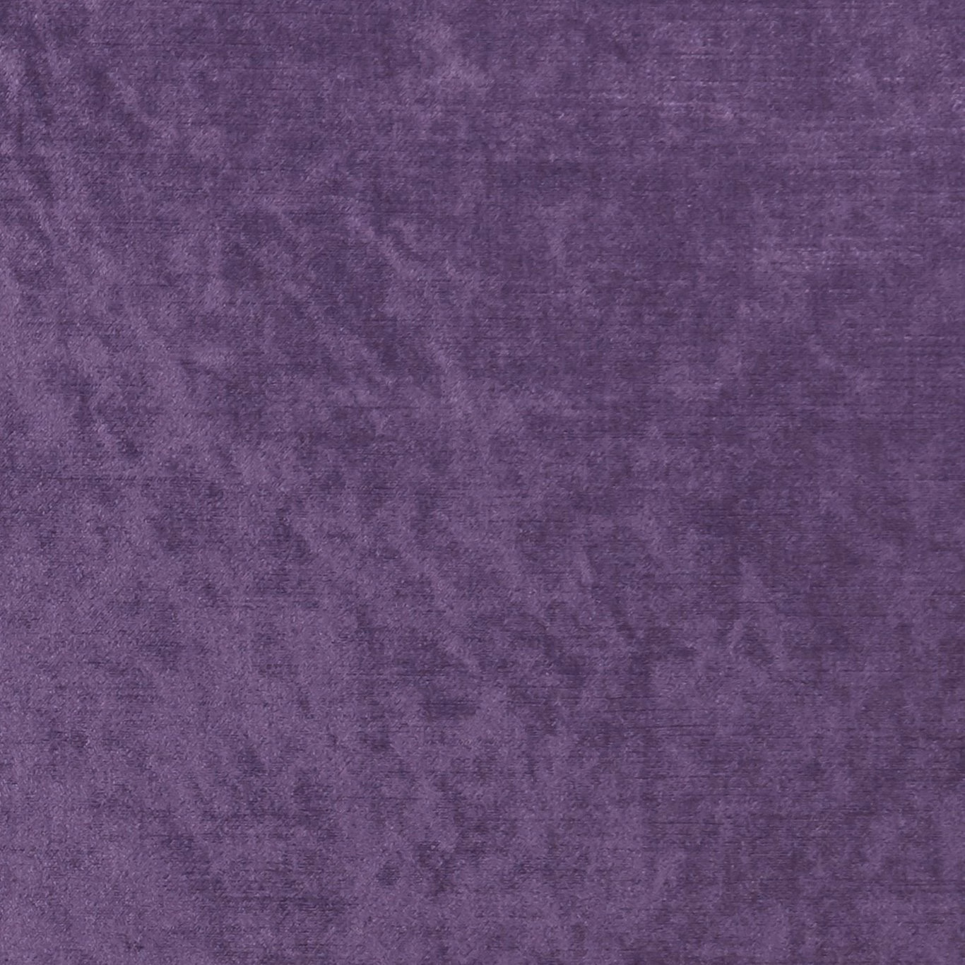 Deep grape-purple textile with cloudy tonal marks and a fine tactile texture