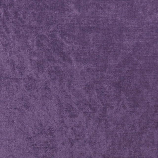 Deep grape-purple textile with cloudy tonal marks and a fine tactile texture