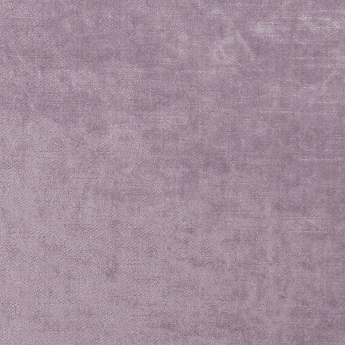 Dusty mauve heather fabric with soft tonal striations and a dense woven texture