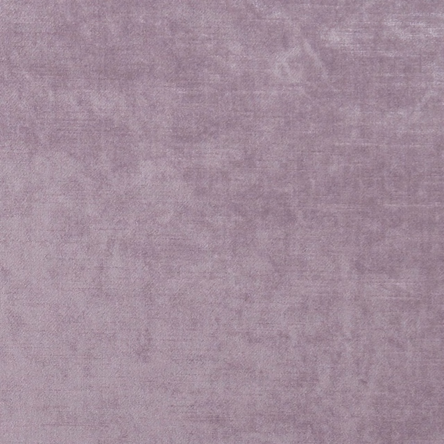 Dusty mauve heather fabric with soft tonal striations and a dense woven texture