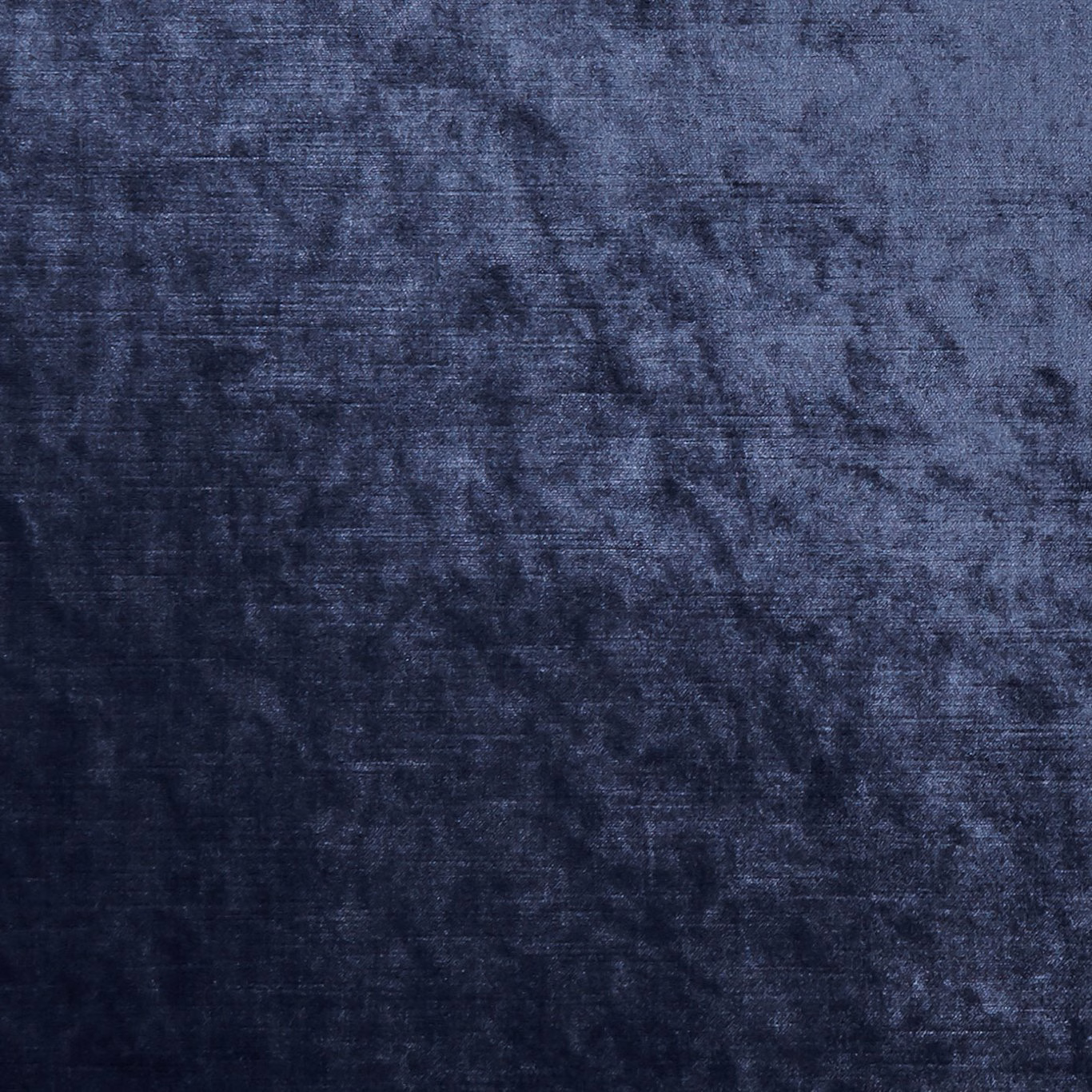 Deep midnight-blue textile with smoky mottling and a softly lustrous woven surface