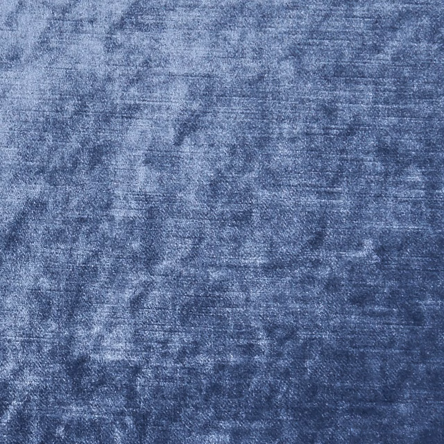 Close-up of slate-blue woven fabric with cloudy blue-grey texture and fine horizontal lines
