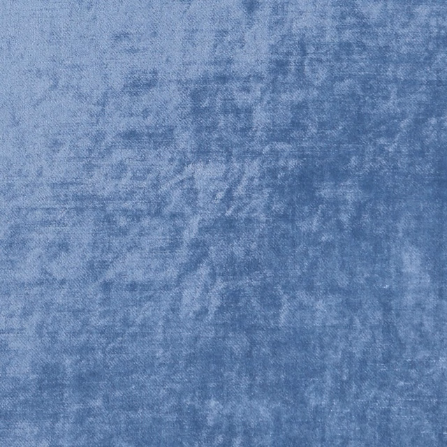 Dusty blue textile with cloudy mottled weave and softly varied tonal surface