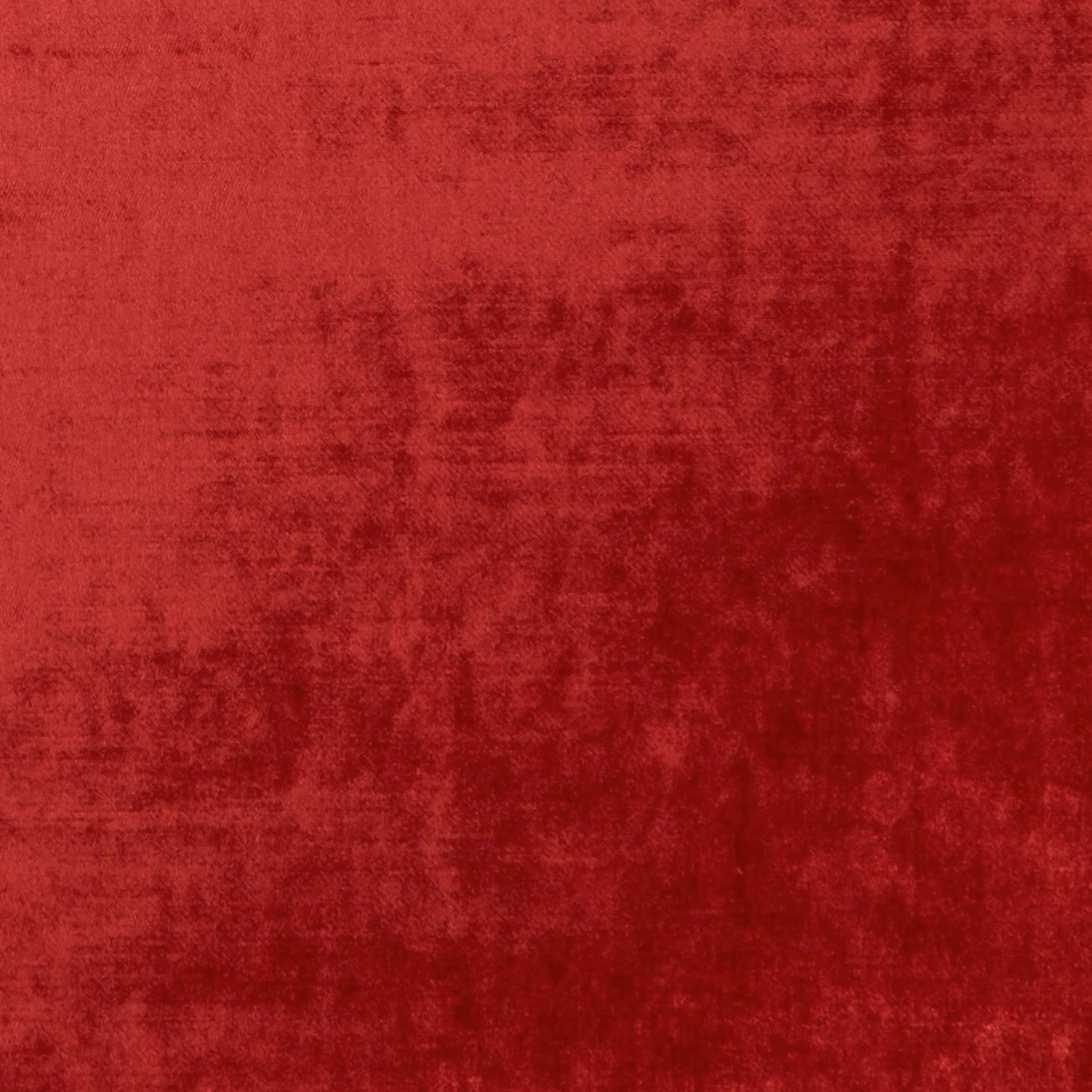 Deep ruby-red fabric with a softly mottled, brushed texture and darker crimson shading