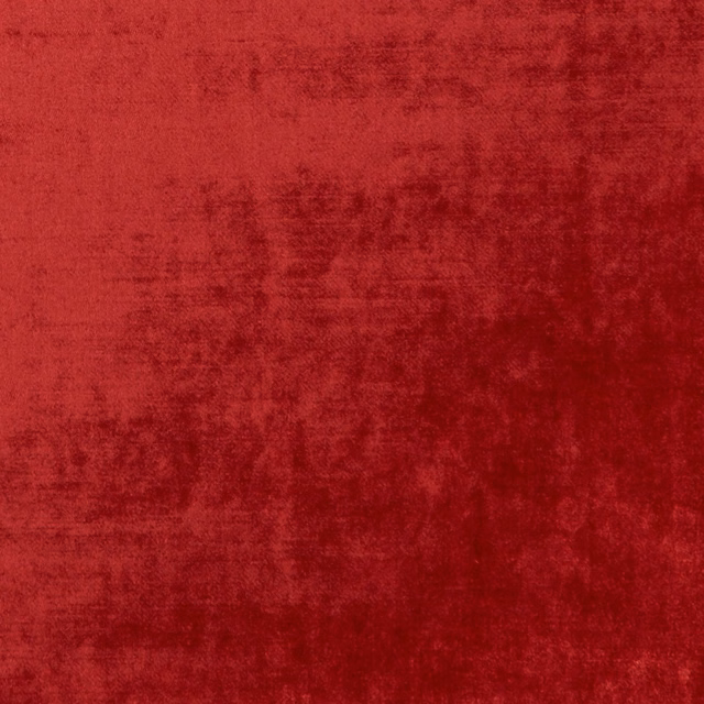 Deep ruby-red fabric with a softly mottled, brushed texture and darker crimson shading