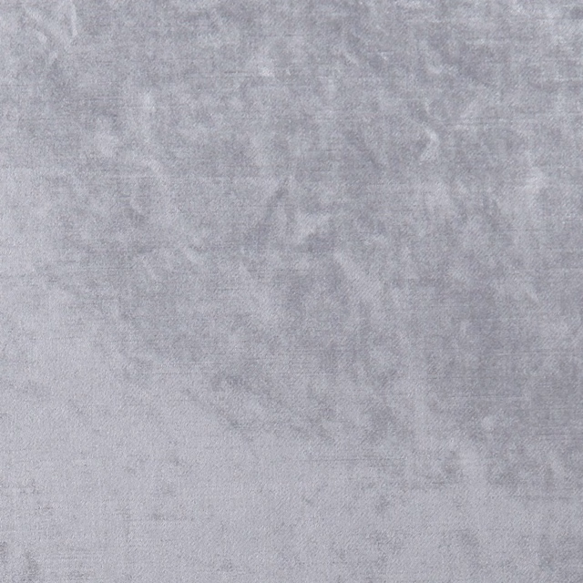 Close-up of cool silver-grey fabric with softly cloudy, brushed texture