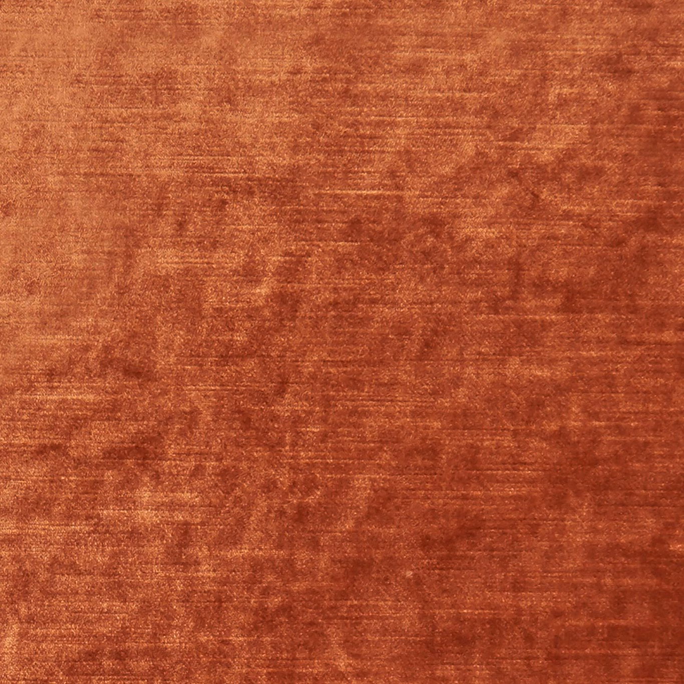 Burnt spice velvet-like textile with horizontal nap and softly mottled rust shading