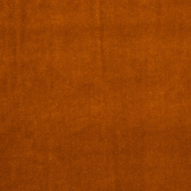 Deep amber-orange plain textile with a softly brushed, subtly mottled surface