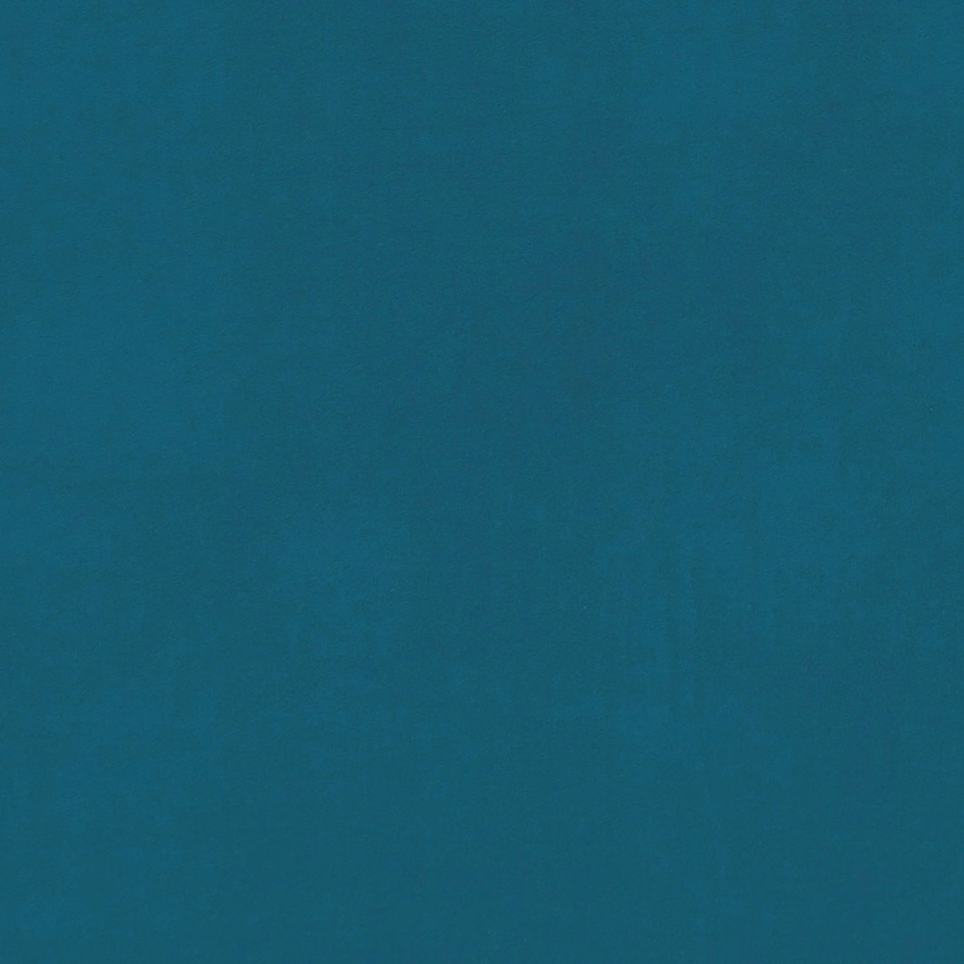 Deep teal-blue plain fabric with a softly mottled, fine-grained surface