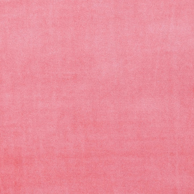 Close-up of softly mottled candy pink textile with a plain, brushed-looking surface
