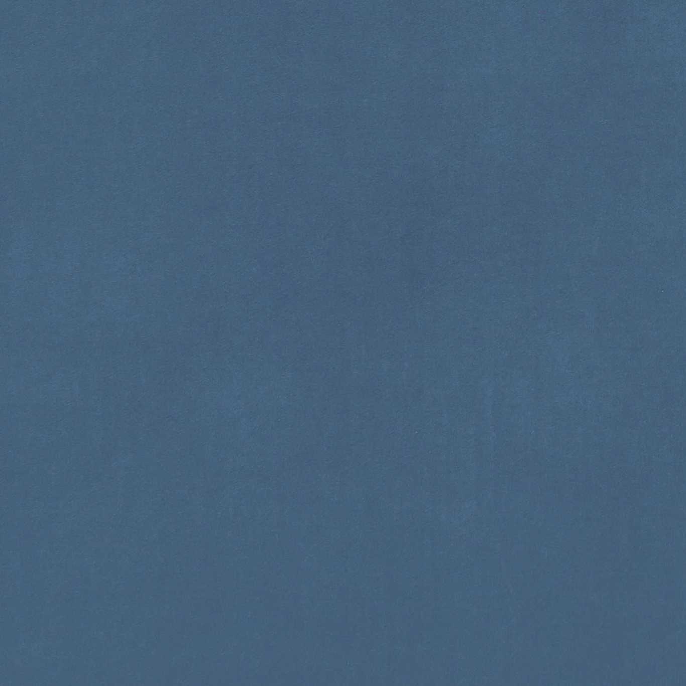 Muted denim-blue plain weave with subtle tonal variation across the swatch