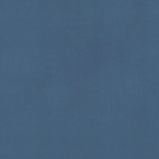 Muted denim-blue plain weave with subtle tonal variation across the swatch