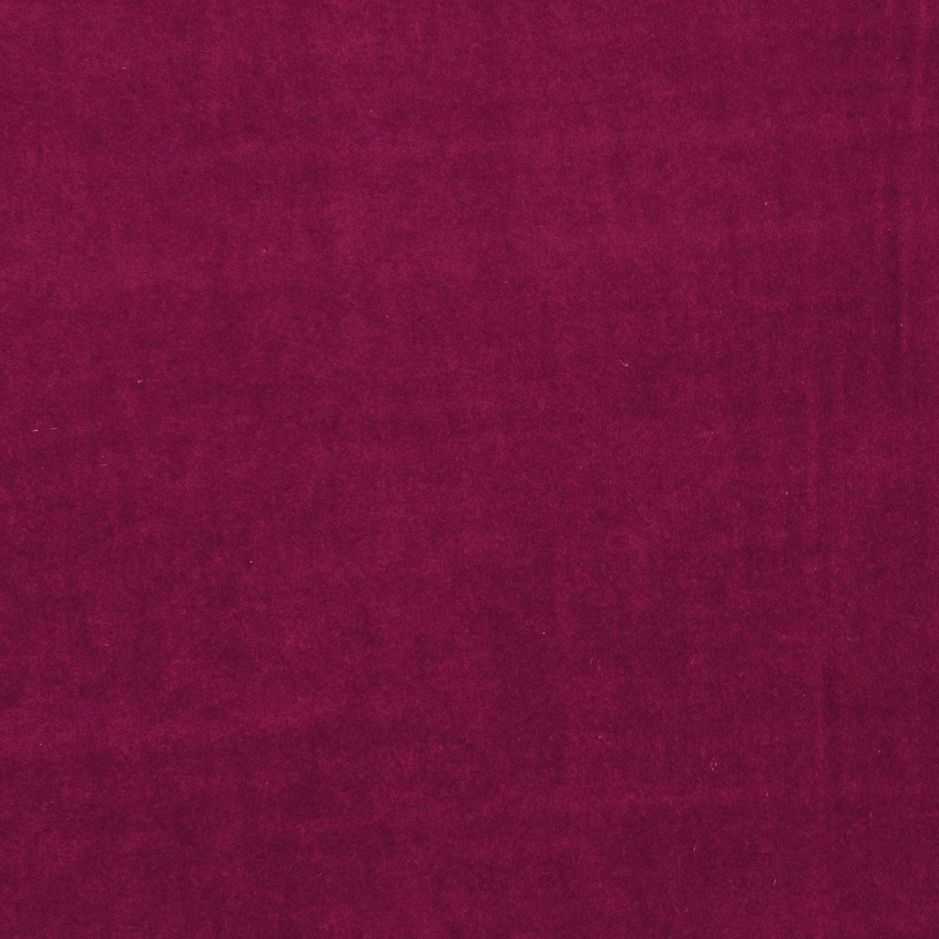 Deep fuchsia magenta plain fabric with softly mottled, lightly lustrous texture