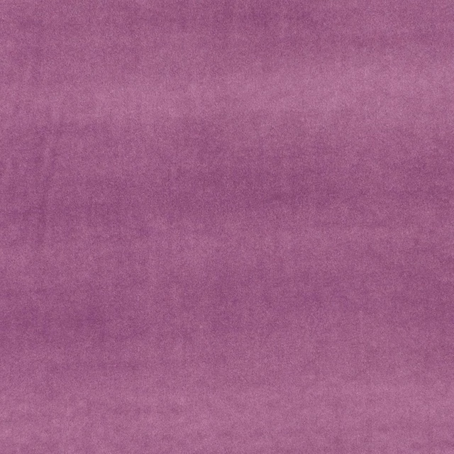 Close-up of heathered mauve-purple textile with softly mottled woven texture