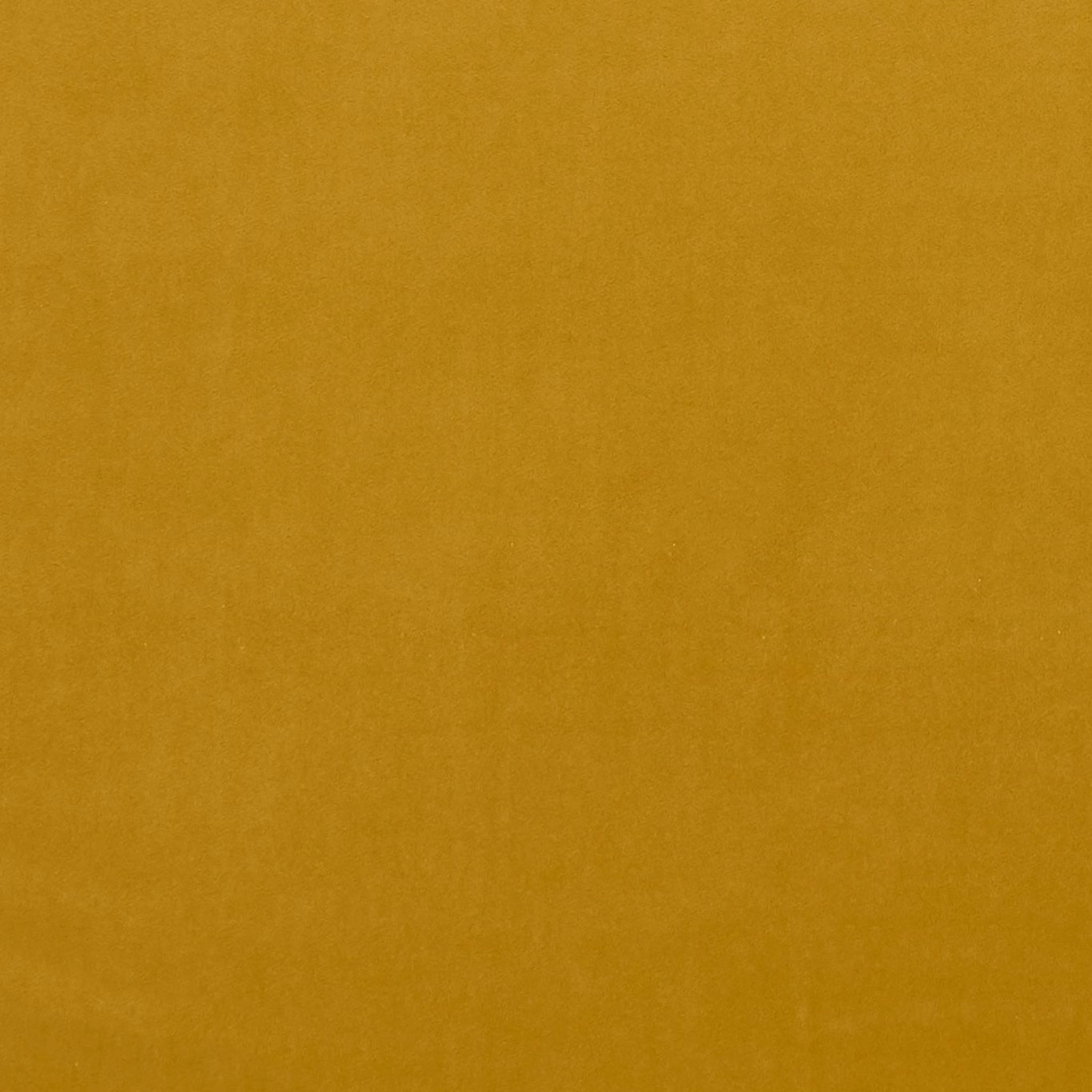 Warm honey-mustard woven textile with a softly mottled, plain surface