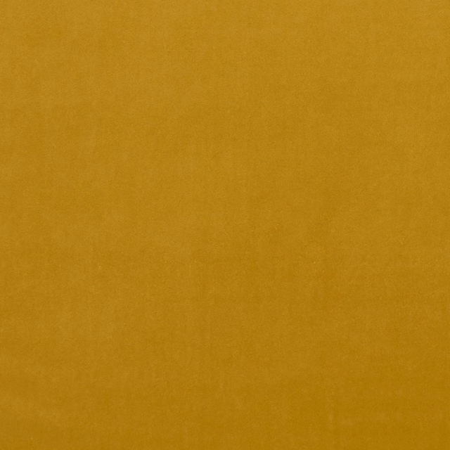 Warm honey-mustard woven textile with a softly mottled, plain surface