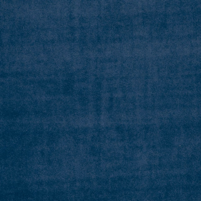Deep indigo blue fabric with softly mottled, cloudy tonal surface texture