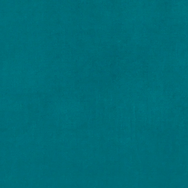 Close-up of deep jade teal fabric with a subtle, softly mottled woven texture