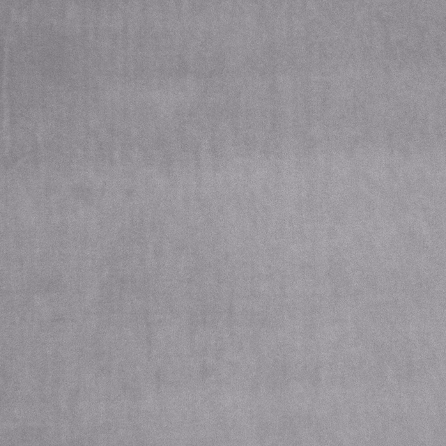 Close-up of cool mist-grey fabric with soft mottled weave and faint vertical striations