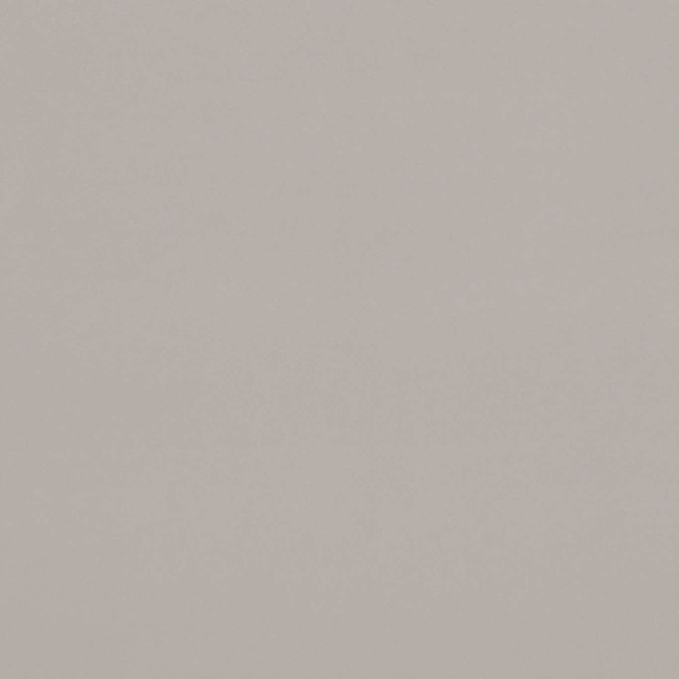 Close-up of Alvar Pebble showing a softly warm grey-taupe plain woven texture