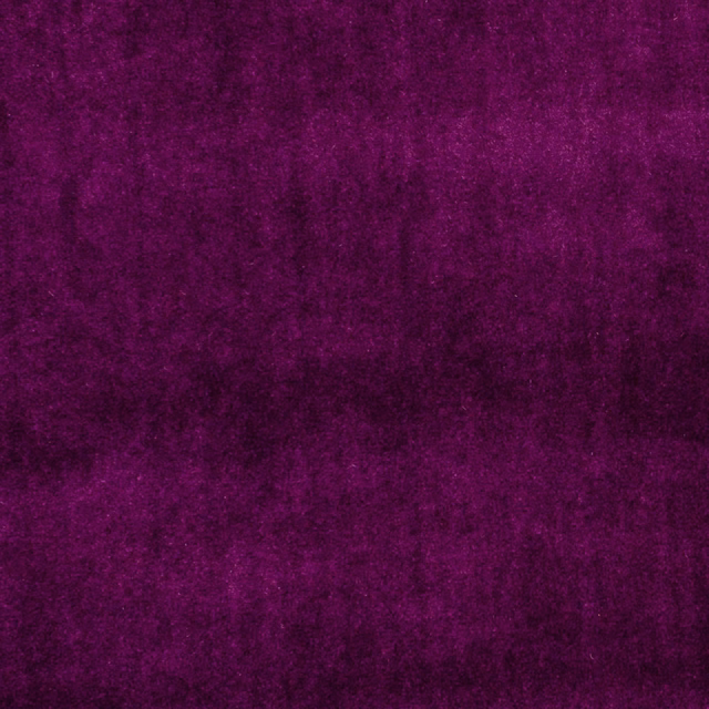 Deep plum-purple fabric with softly mottled, velvety texture and subtle tonal highlights