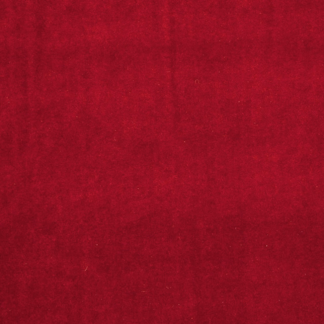 Deep ruby red fabric with a softly mottled, light-catching surface