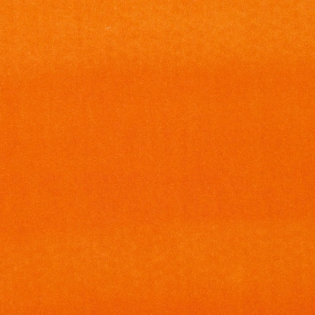 Warm sunset-orange fabric with subtle vertical nap and softly mottled surface texture